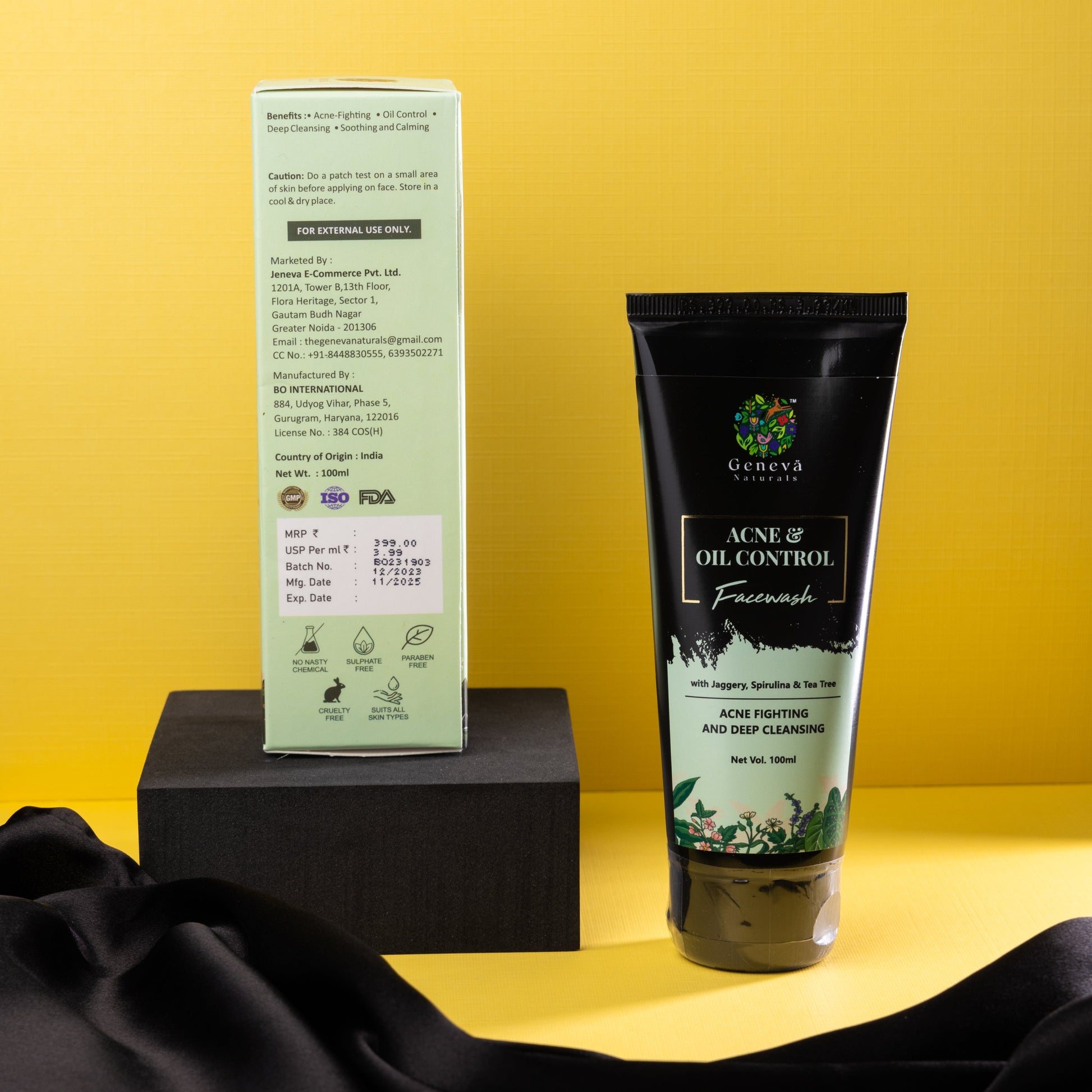 Back label of Geneva Naturals Acne and Oil Control Face Wash 100ml showing benefits, ingredients, manufacturing details, and cruelty-free certification next to product tube